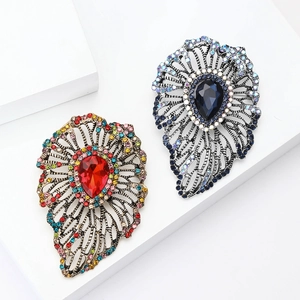Vintage leaf-shaped brooch pins with crystal glass and hollow design in red and blue