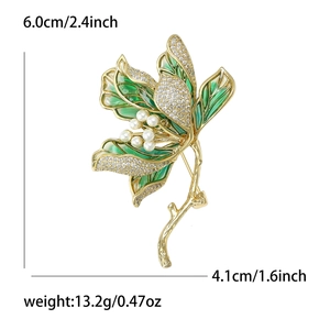 Elegant gold lotus leaf brooch with green enamel, crystals, and white pearls, 6.0cm x 4.1cm