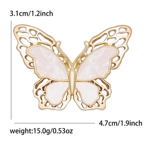 Elegant gold double-layered butterfly brooch with pink shell wings and detailed inlay work