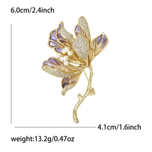 Luxurious lotus flower brooch with purple enamel petals, pearls, and sparkling crystals