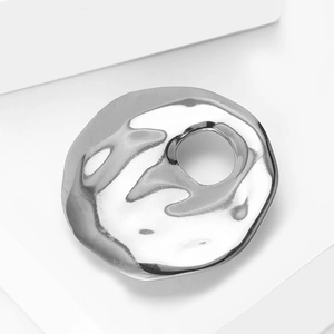 Silver liquid metal hollow round brooch with organic lava texture and modern art style