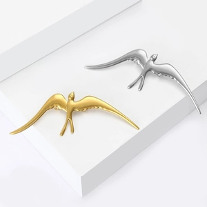 Spille a rondine minimaliste in metallo liquido oro e argento per abbigliamento elegante