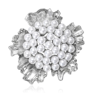 Elegant floral pearl brooch with silver metal petals and cluster pearls for suits