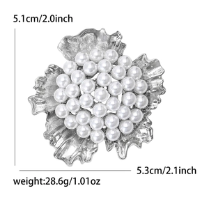 Elegant silver flower brooch with pearls, sized 5.1cm x 5.3cm, perfect for suits