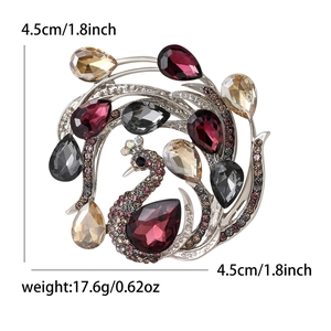 Elegant peacock brooch pin with multicolored crystals and sparkling rhinestones for suits