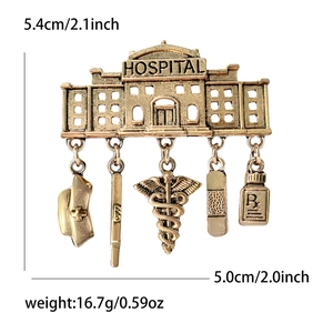 Vintage gold hospital medical brooch with syringe and nurse hat charms for suits