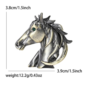 Broche tête de cheval en alliage or et argent vintage avec un œil en pierre verte