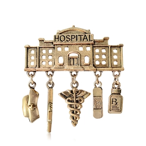 Unique vintage medical hospital pendant brooch in gold alloy with creative charms