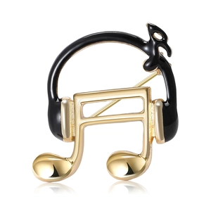 Minimalist gold and black enamel headphones music note brooch pin with elegant reflection