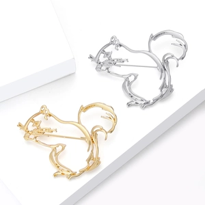 Elegant hollow squirrel brooch in gold and silver finish for stylish women suits