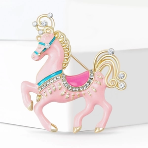 Sparkling carousel horse brooch in pink enamel and gold-plated alloy with crystals