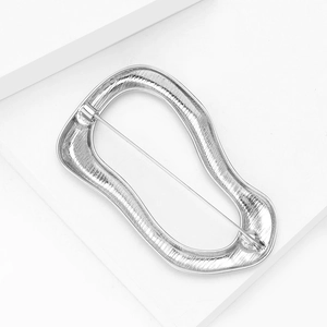 Irregular silver alloy circular brooch with smooth minimalist abstract ring design