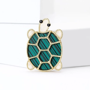 Exquisite turtle brooch with golden beaded edges and dark green striped acrylic shell