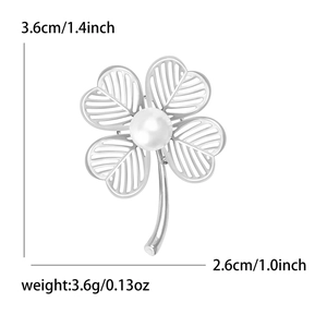 Elegant hollow-out four-leaf clover brooch with pearl center and silver metal finish