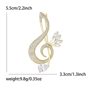 Elegant gold treble clef music note brooch with cubic zirconia stones for suit lapels