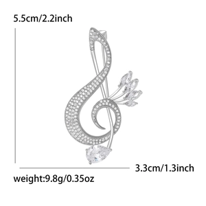 Silver treble clef musical note brooch with white cubic zirconia crystals for suits