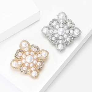 Baroque style hollow pearl brooch with rhinestones in gold and silver plating