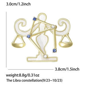 Spécifications de taille pour broche Balance dorée avec strass bleus brillants