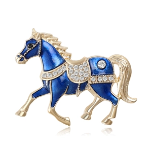 Elegant gold-plated horse brooch with deep blue enamel and sparkling rhinestones