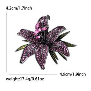 Elegant lily flower brooch with pink rhinestones and dark green enamel accents