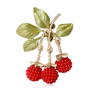 Elegant blackberry brooch with red berries and green enamel leaves in gold finish