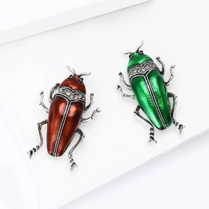 Broches scarabées vintage en émail avec strass rouges et verts sur socles blancs