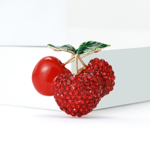 Cute cherry brooch with sparkling red rhinestones and green enamel leaf design