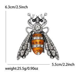 Retro bee brooch with silver plating, sparkling rhinestones and orange enamel finish