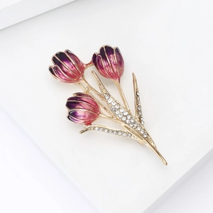 Detail of tulip brooch with purple enamel gradient petals and sparkling rhinestones