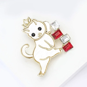 Elegant white enamel cat brooch with crown and colorful rhinestones on display stand