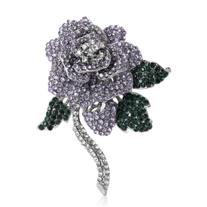 Elegant rose flower brooch with purple rhinestones and green emerald stones on silver stem