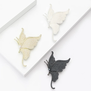 Elegant butterfly brooches set with micro pearls and golden plating for women fashion