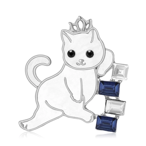 Luxury cat brooch with crown and rectangular crystals in blue and white on white background