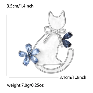 Detail showing dimensions of alloy cat brooch with blue crystals and white finish