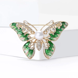 Broche papillon de luxe avec ailes en émail dégradé, cristaux et grande perle centrale