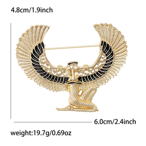 Gold Egyptian goddess brooch with black wings and detailed wingspan design for coat