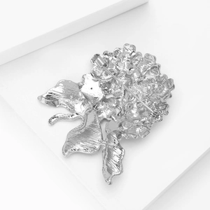 Detailed back view of a silver floral hydrangea brooch with secure rotating pin closure