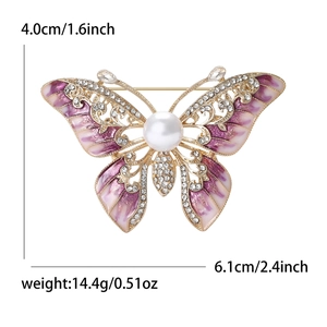 Broche papillon de luxe avec ailes en émail violet, cristaux et grande perle blanche