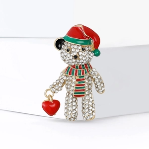 Sparkling Christmas bear brooch with crystals and enamel heart detail for attire