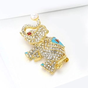 Elegant gold elephant brooch with sparkling rhinestones, blue enamel and pearl accent
