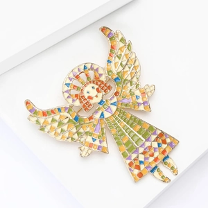 Detailed close-up of a luxury angel brooch with colorful enamel mosaic on a white pedestal