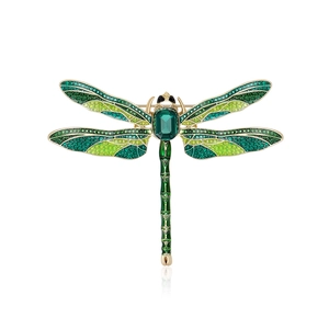 Elegant gold dragonfly brooch with green enamel wings and sparkling rhinestones for women