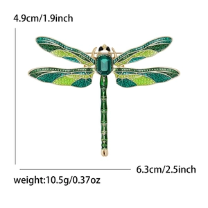 Exquisite enamel dragonfly brooch with green rhinestones and crystal wings on white base
