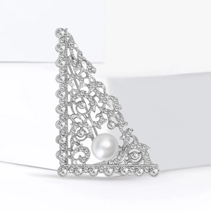 Elegant triangular brooch with sparkling crystals and large white pearl on silver base
