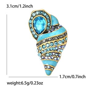 Blue enamel conch shell brooch with teardrop gemstone and dimensions 3.1cm x 1.7cm