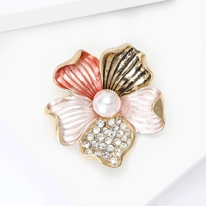 Elegant enamel flower brooch with rhinestones and white pearl on gold setting