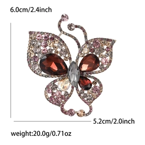 Hollow butterfly brooch with multicolored rhinestones and large drop gemstones