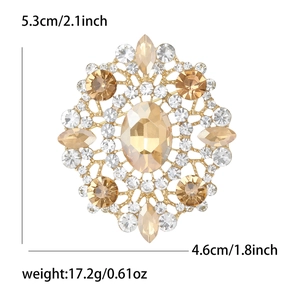 Detailed view of floral brooch with champagne oval gemstone and rhinestones, 5.3x4.6cm