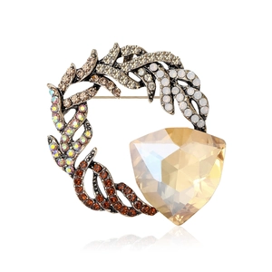 Elegant vintage circular leaf brooch with champagne crystal and colorful rhinestones