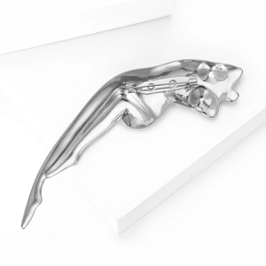 Detailed back view of a polished silver leopard brooch with a secure metal pin fastening
